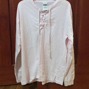 Pink Victoria’s Secret shirt.